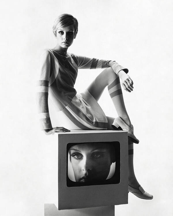 Model Art Print featuring the photograph Twiggy Atop A Television Box by Bert Stern