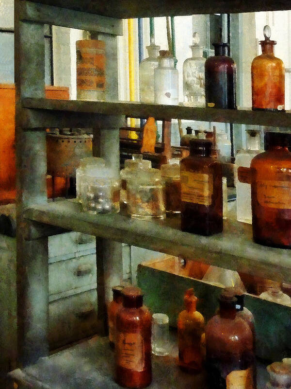 Science Art Print featuring the photograph Chemist - Bottles of Chemicals Tall and Short by Susan Savad