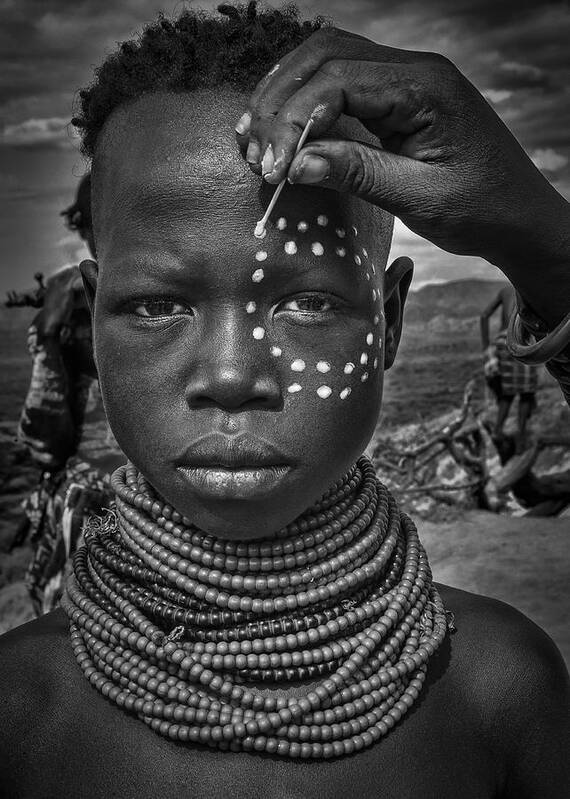 Omo Valley Art Print featuring the photograph Painting The Face Of A Karo Tribe Girl (omo Valley-ethiopia) by Joxe Inazio Kuesta