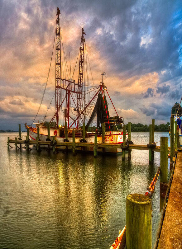 Clouds Art Print featuring the photograph Shrimp Boat at Sunset by Debra and Dave Vanderlaan