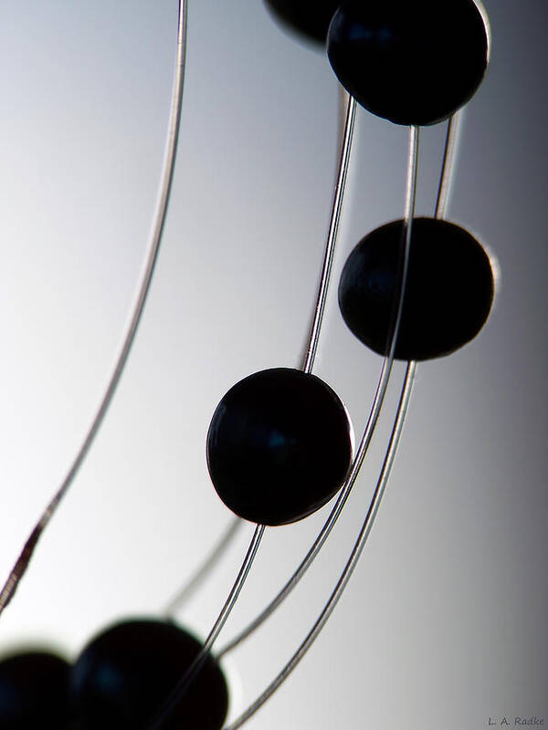 Abstract Art Print featuring the photograph Black Pearls by Lauren Radke