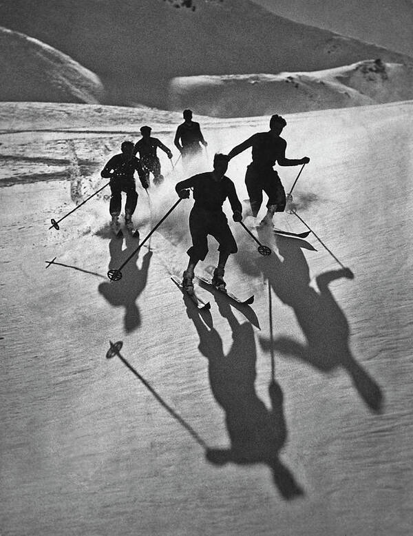 Skiing Art Print featuring the photograph Skiers And Shadows #1 by Archive Photos