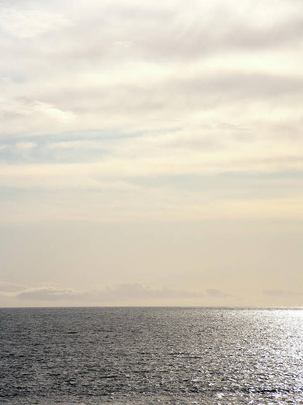 Britain Art Print featuring the photograph Sunlight gleaming on the sea #1 by Seeables Visual Arts