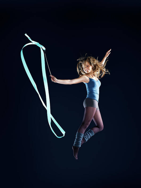 Human Arm Art Print featuring the photograph Girl Suspended In Air, Dancing, Jumping by Jakob Helbig