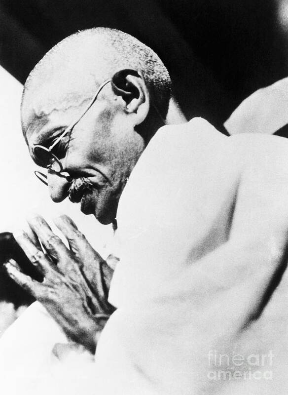 Releasing Art Print featuring the photograph Mahatma Gandhi Bowing by Bettmann