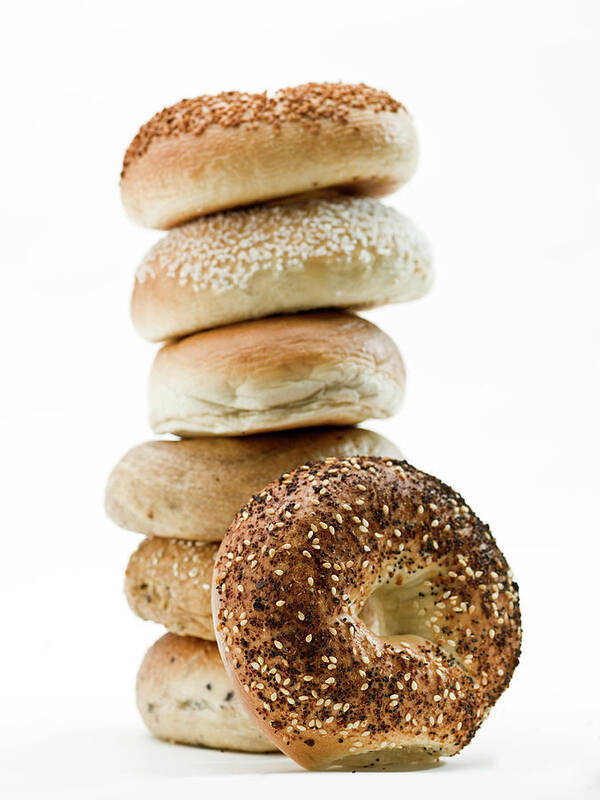 Breakfast Art Print featuring the photograph Stack Of Assorted Bagels by Juanmonino