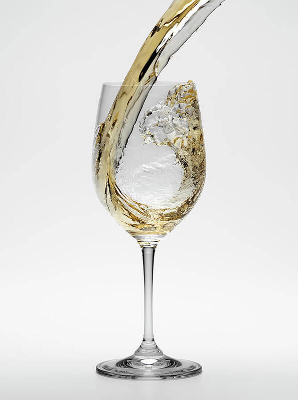White Background Art Print featuring the photograph White Wine Being Poured Into Wineglass by Don Farrall