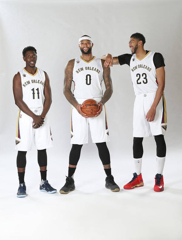 Jrue Holiday Art Print featuring the photograph Demarcus Cousins, Jrue Holiday, and Anthony Davis by Layne Murdoch