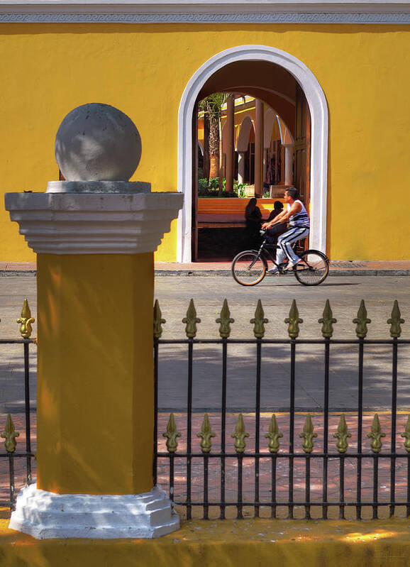 Valladolid Art Print featuring the photograph Valladolid Colors - street scene with bicyclist and yellow architecture by Peter Herman