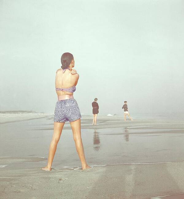 Fashion Art Print featuring the photograph Back View Of Three People At A Beach by Serge Balkin