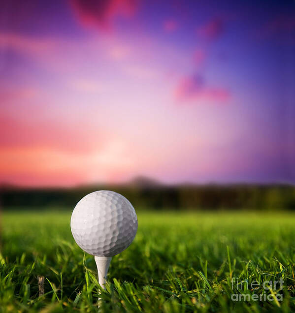 Sports Art Print featuring the photograph Golf ball on tee at sunset by Michal Bednarek