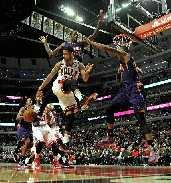 Nba Pro Basketball Art Print featuring the photograph Phoenix Suns V Chicago Bulls by Jonathan Daniel