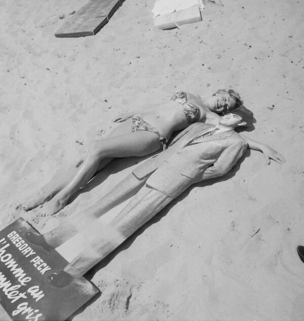 Swimwear Art Print featuring the photograph Diana Dors Lying On The Beach At Cannes by Keystone-france