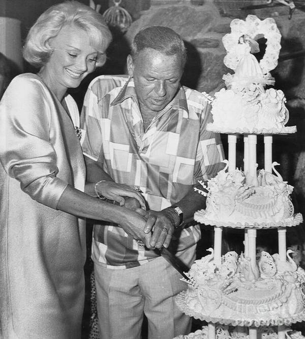 Mature Adult Art Print featuring the photograph Frank Sinatra Cutting Wedding Cake by Bettmann