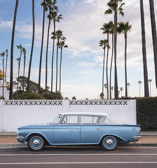 #faatoppicks San Diego Rambler Encinitas North County Southern California Beach Ocean Palm Trees Sunset Classic Cars West Coast United States Coastal Region Still Life Color Photography Road Street Nikon D800 William Dunigan United States Trip Urban Street Scene American Motors Corporation United States Americana Clouds Cool Art Print featuring the photograph Encinitas CA Rambler by William Dunigan