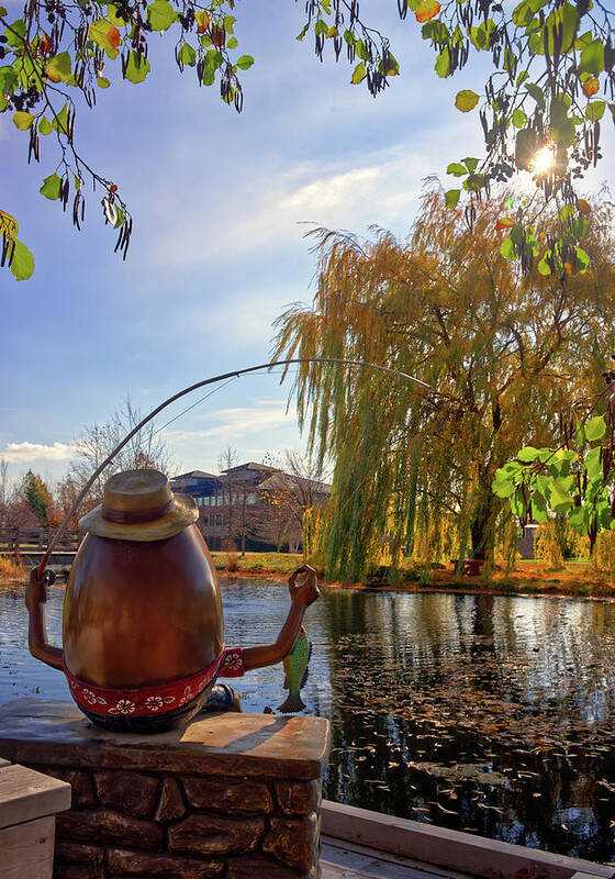 Epic Systems Art Print featuring the photograph An Epic Fishing Hole - Humpty Dumpty catches a fish at the Voyager Hall pond on Epic Systems campus by Peter Herman