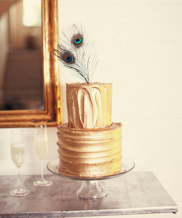 Cake Art Print featuring the photograph Tiered Cake With Peacock Feathers On Top by Gillham Studios