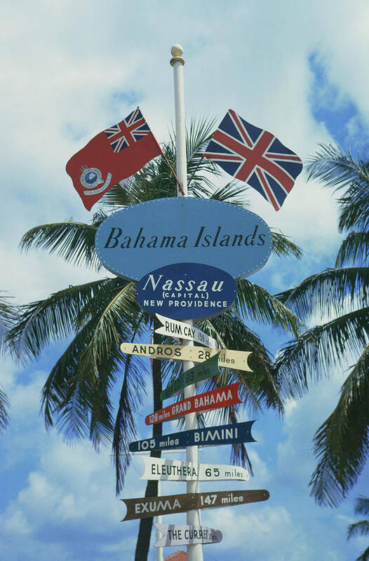 Pole Art Print featuring the photograph Bahamas Signpost by Slim Aarons