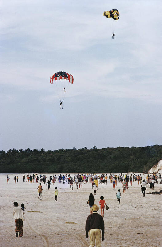 Parachuting Art Print featuring the photograph Harbour Isle Parachutists by Slim Aarons