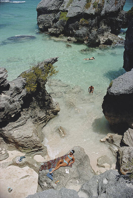 People Art Print featuring the photograph On The Beach In Bermuda by Slim Aarons