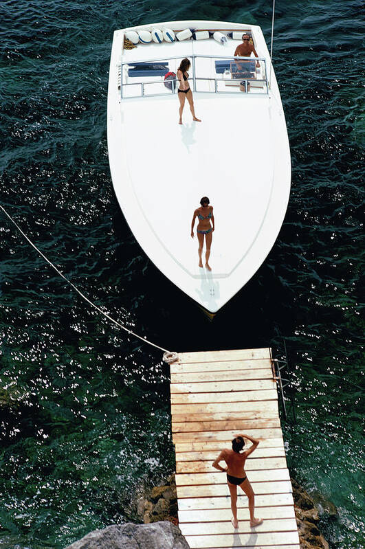 Summer Art Print featuring the photograph Speedboat Landing by Slim Aarons