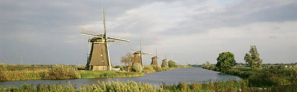 Photography Art Print featuring the photograph Netherlands, Holland, Windmills #1 by Panoramic Images