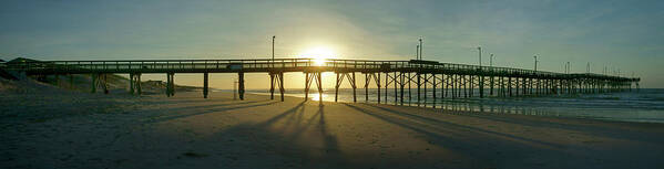 Beach Scene Art Print featuring the photograph Sunrise at the Jolly Roger Pier by Mike McGlothlen