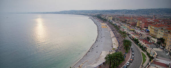 Above Art Print featuring the photograph Sunset over the French Riviera in Nice on a misty evening by Jean-Luc Farges