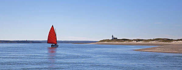Sail Art Print featuring the photograph Ripple Catboat with Red Sail and Lighthouse by Charles Harden