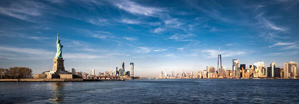 Downtown District Art Print featuring the photograph Panoramic view of New York City and the Statue of Liberty by Yongyuan