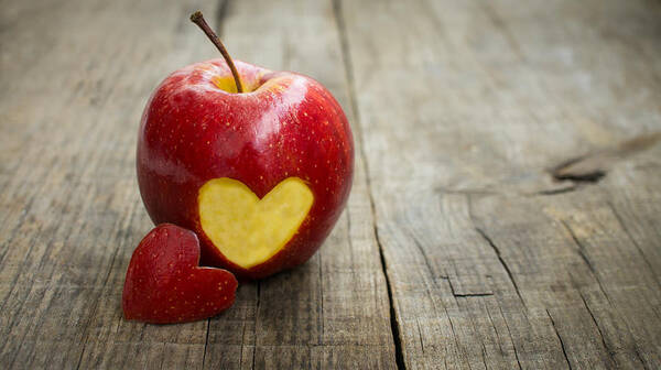Apple Art Print featuring the photograph Apple with engraved heart by Aged Pixel