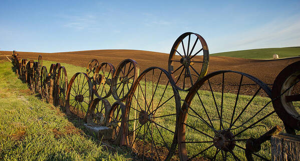 Palouse Art Print featuring the photograph Fence of Wheels by Mary Lee Dereske