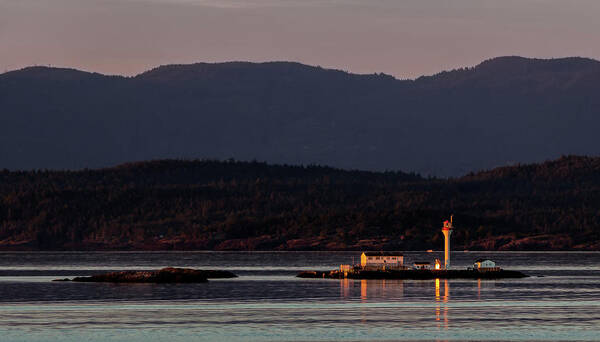 Reflection Art Print featuring the photograph Isolated Lighthouse by Ed Clark