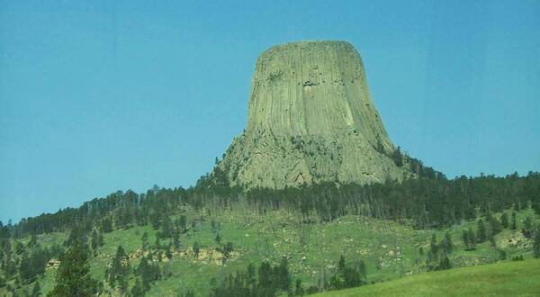 Rocky Mountain Art Print featuring the photograph The Devils Tower by Remegio Onia
