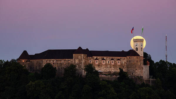 Ljubljana Art Print featuring the photograph Full moon behind Ljubljana Castle by Ian Middleton