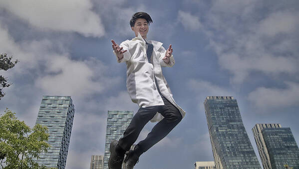 Expertise Art Print featuring the photograph Portrait of smiling doctor jumping by Runstudio