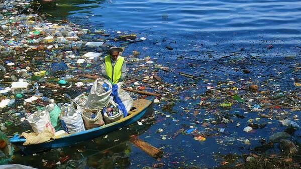 Trash Art Print featuring the photograph Washed-up trash collection by Robert Bociaga