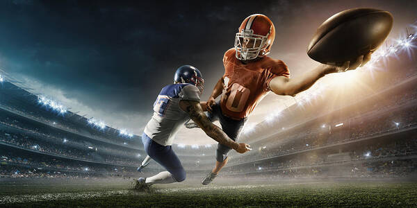 Event Art Print featuring the photograph American football player being tackled #2 by Dmytro Aksonov