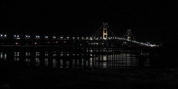 Michigan Art Print featuring the photograph Mackinac Bridge on a cold night by Keith Stokes