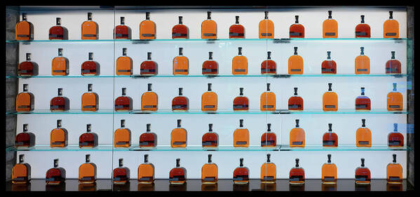 Woodford Reserve Art Print featuring the photograph Bourbon Bottles by Susan Rissi Tregoning