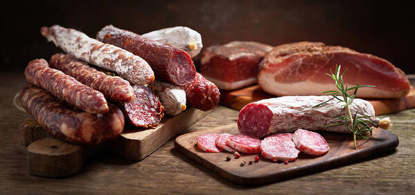 Large Group Of Objects Art Print featuring the photograph Various kind types of salami, speck and sausages by Nitrub