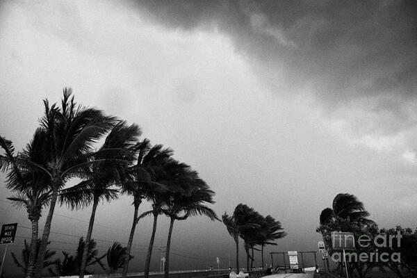 Dark Art Print featuring the photograph Dark Rain Storm Clouds Blow Over The Seven-mile Bridge Marathon Key Florida Keys Usa #1 by Joe Fox