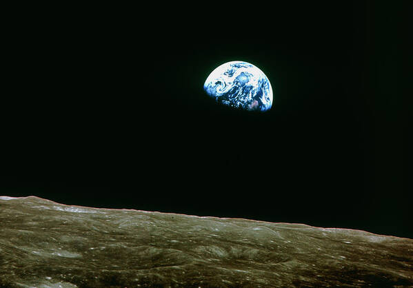 Earthrise Art Print featuring the photograph Earthrise Over Moon #1 by Nasa