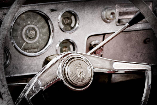 Studebaker Steering Wheel Emblem Art Print featuring the photograph Studebaker Steering Wheel Emblem #1 by Jill Reger