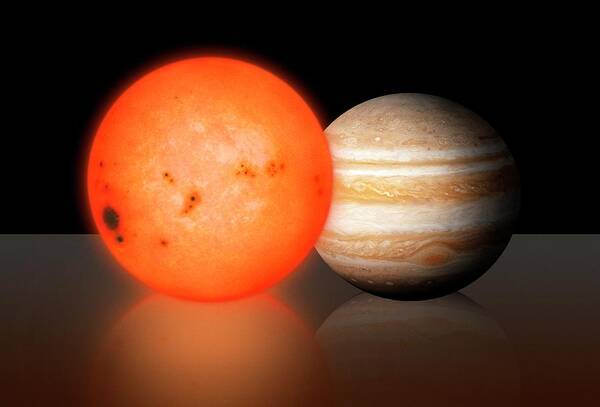 Artwork Art Print featuring the photograph Trappist-1 Compared To Jupiter #1 by Mark Garlick/science Photo Library
