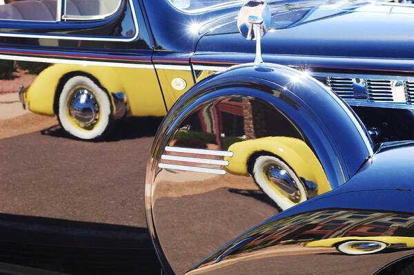 1937 Cord 812 Phaeton Reflected Into Packard Art Print featuring the photograph 1937 Cord 812 Phaeton Reflected into Packard by Jill Reger