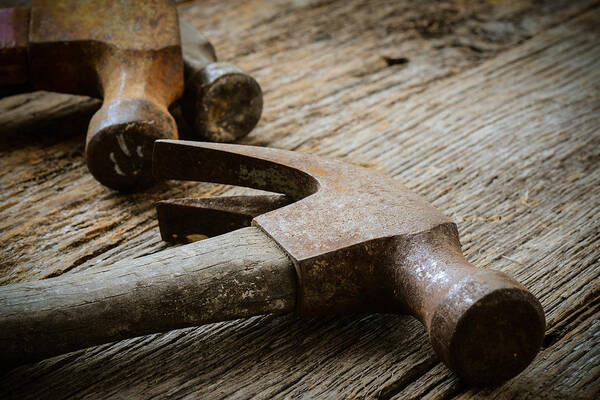 Background Art Print featuring the photograph Old Hammers on Rustic Wood Background #2 by Brandon Bourdages