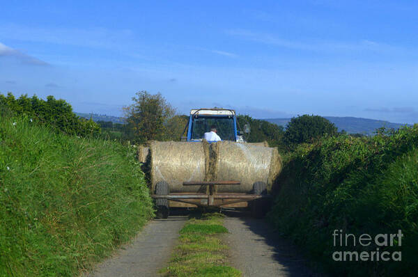 Tractor Art Print featuring the photograph A country road by Joe Cashin