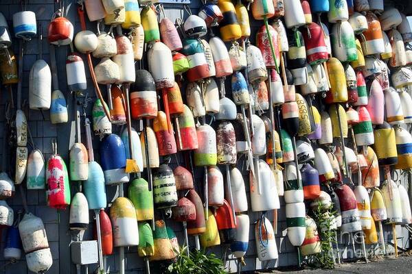 Buoys Art Print featuring the photograph A Wall of Bouys by Rosemary Aubut