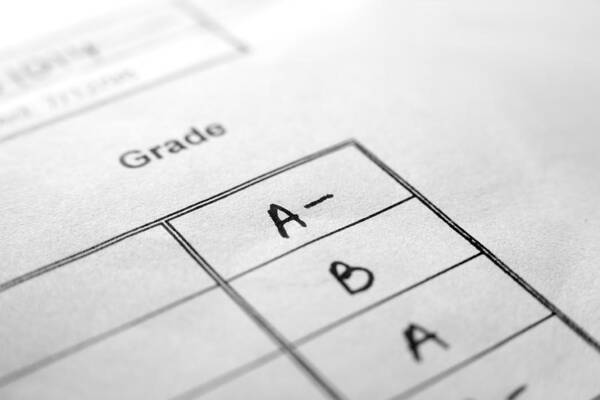 Education Art Print featuring the photograph An up close picture of report card grades by Jaker5000